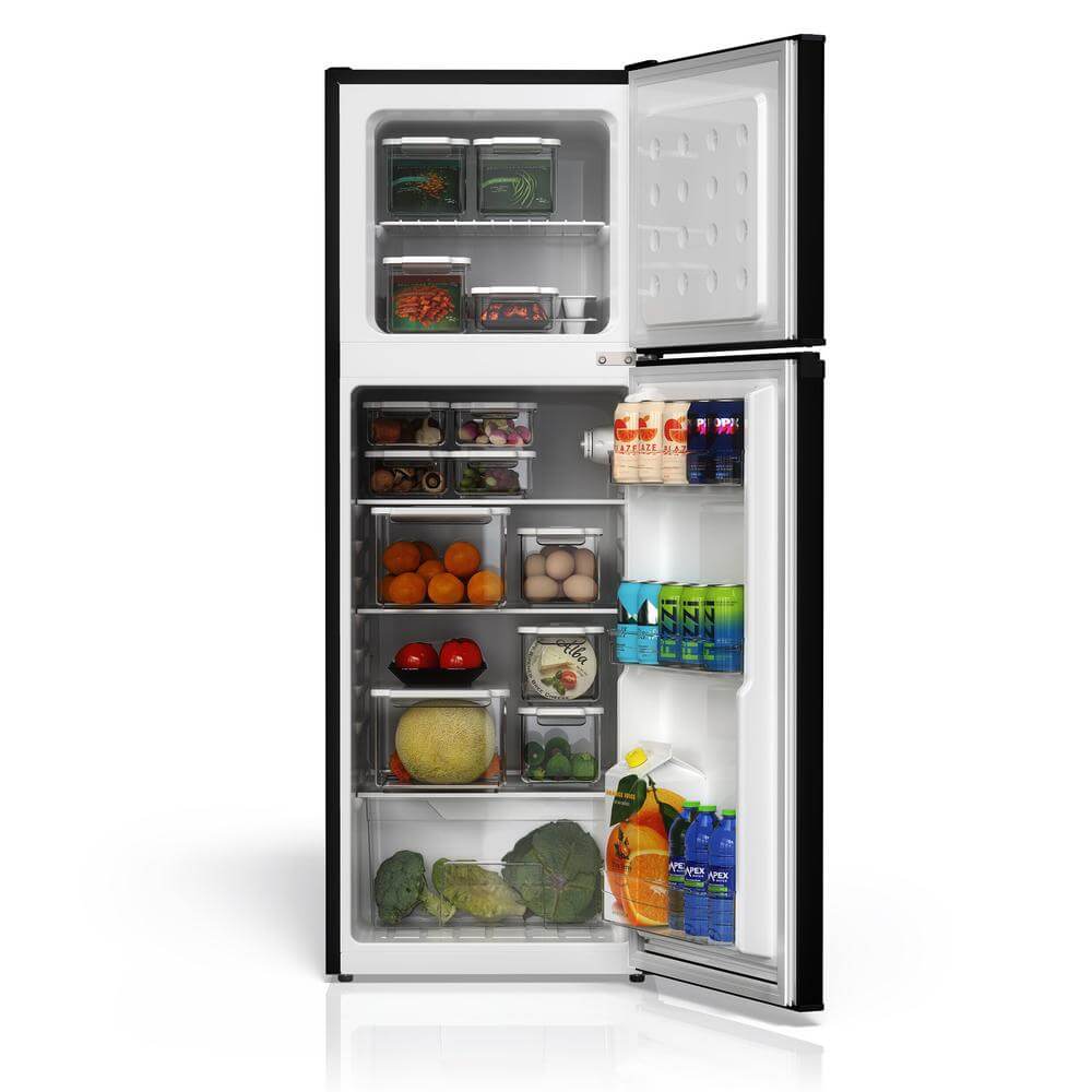 Open TCL 18 in. 4.7 Cu. Ft. Compact Top Freezer Mini Fridge in Black (TRM47D5AB) with various food items on a white background