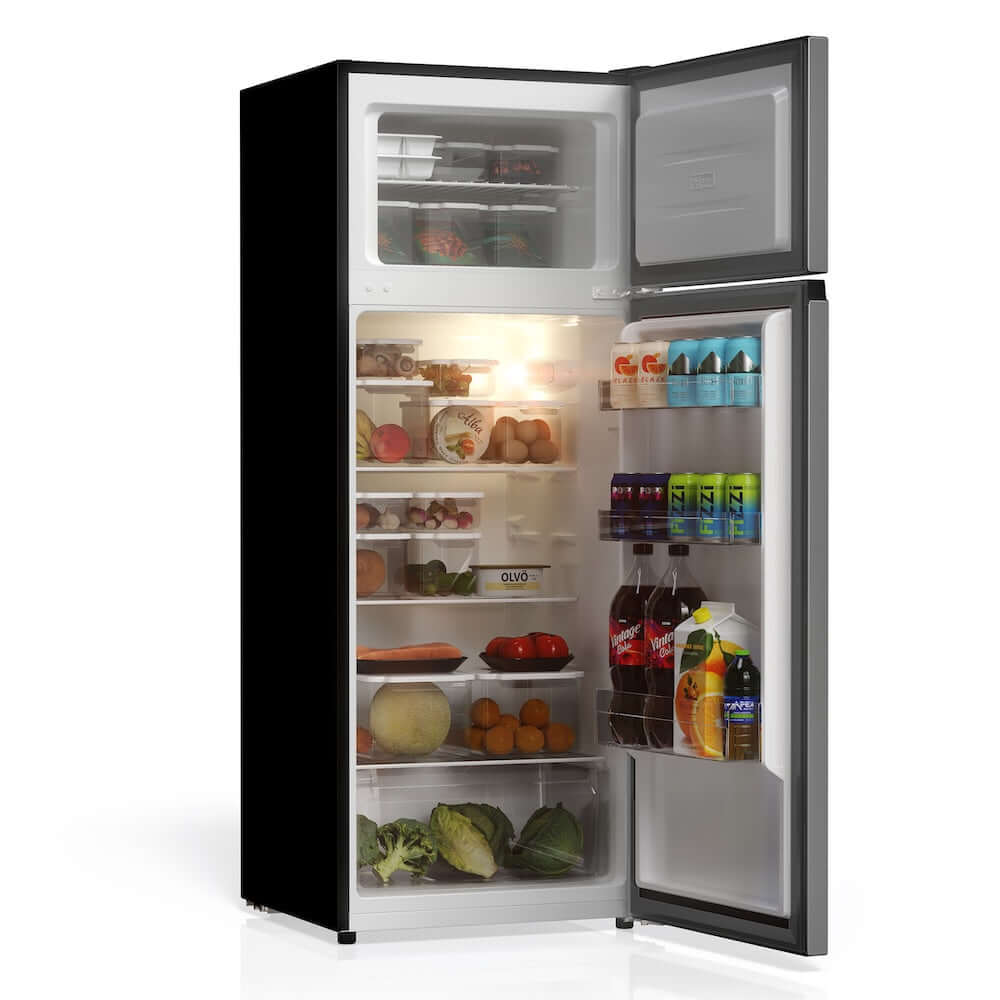 Open TCL 22 in. 7.3 Cu. Ft. Compact Top Freezer Refrigerator in Silver (TRT07T4AL) with food items on a white background