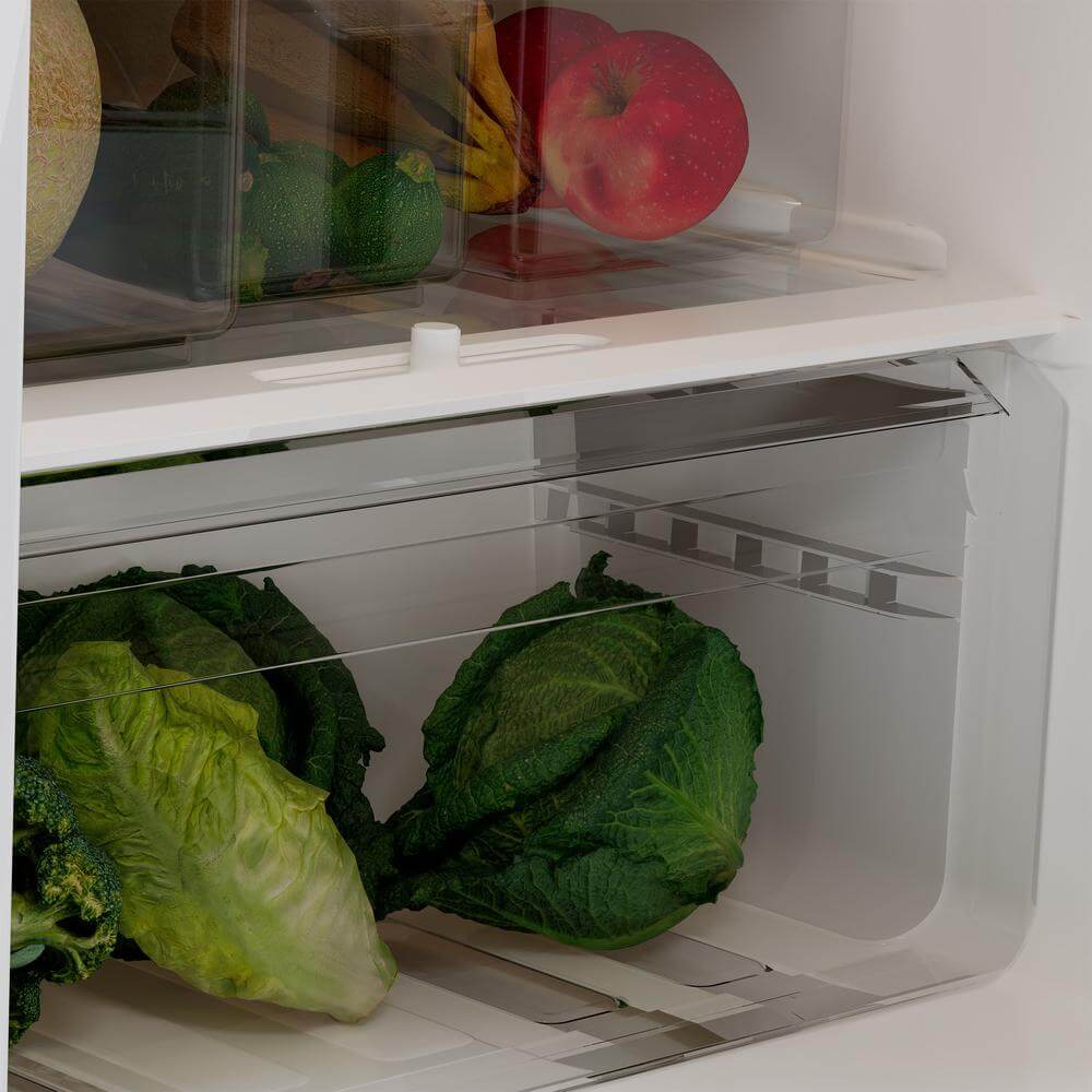 Open refrigerator door showing fresh produce inside
