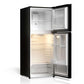 TCL 24 in. 10.1 Cu. Ft. Top Freezer Refrigerator in Black (TRT10T4AB) with open doors on a white background