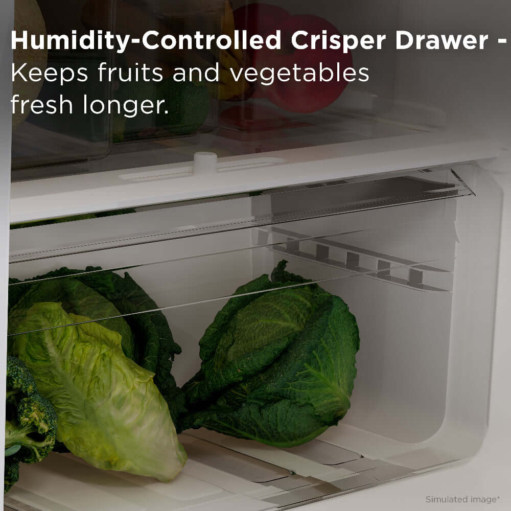 TCL 24 in. 10.1 Cu. Ft. Top Freezer Refrigerator in White (TRT10T4AW) humidity-controlled crisper drawer with fresh vegetables inside, text indicating freshness improvement.