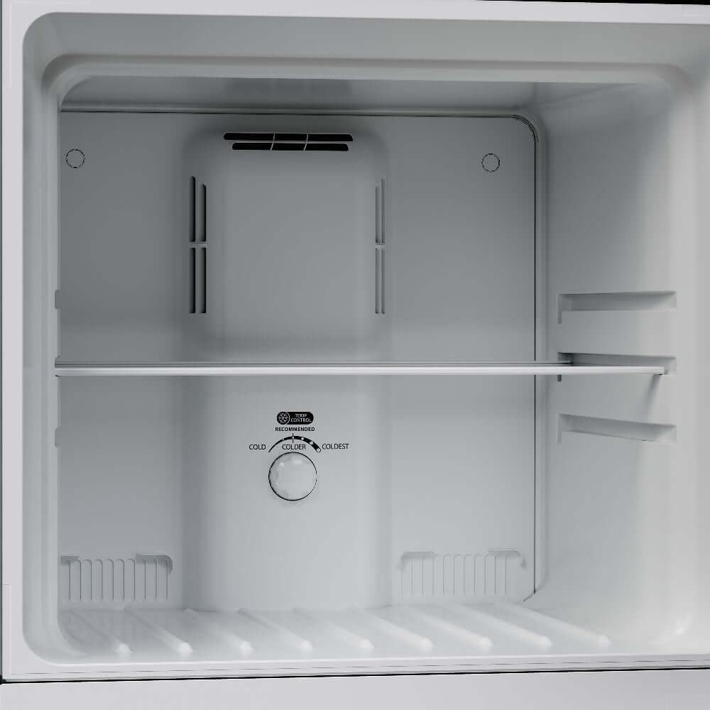 Empty refrigerator freezer compartment with control panel