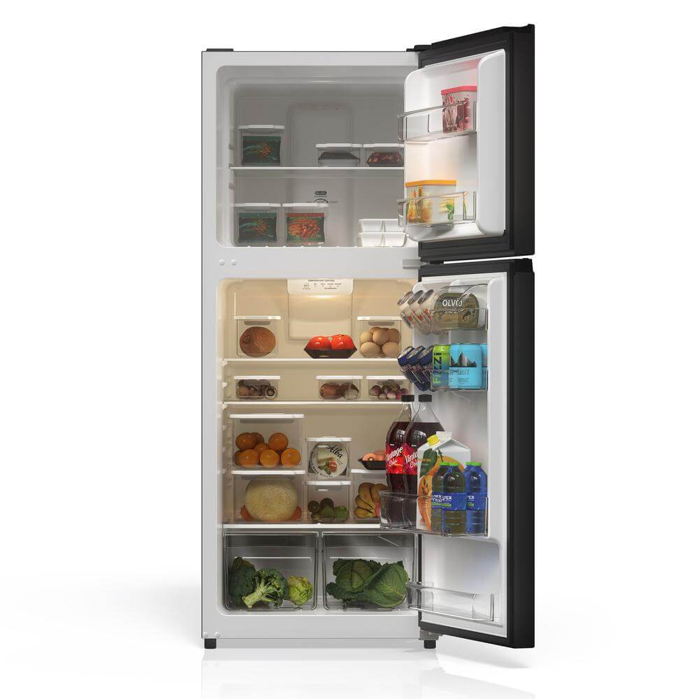 Open TCL 24 in. 11.6 Cu. Ft. Top Freezer Counter-Depth Refrigerator in Black (TRT12T4AB) with various food items on a white background