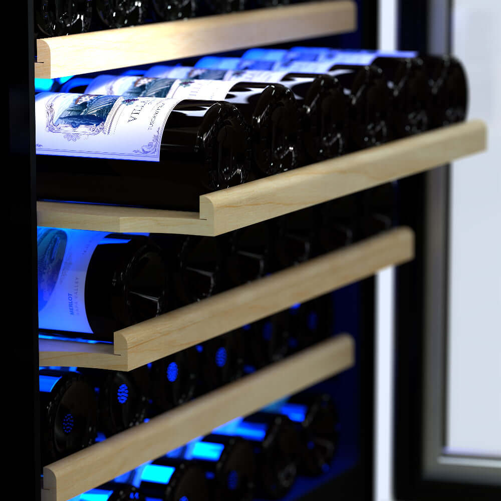 Wine bottles in TCL 24 in. 52 Bottle 5.3 Cu. Ft. Compact Freestanding Wine Cooler with Glass Door (TRW52B7AS) with wooden shelves and blue lighting.