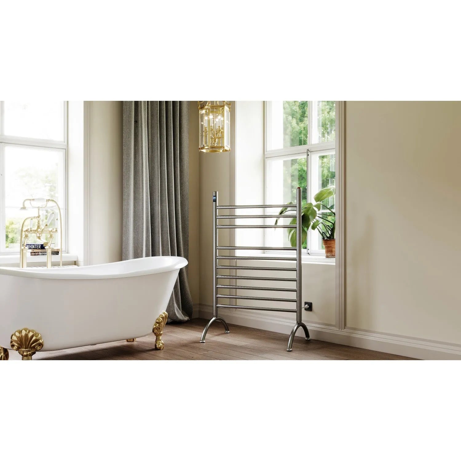 Bathroom with freestanding bathtub, Kingston Brass Templeton Freestanding Plug-In Towel Warmer Brushed Nickel, and large window.