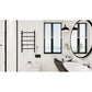 Modern bathroom interior with Kingston Brass Templeton Freestanding/Wall Mount Hardwired or Plug-In Towel Warmer Matte Black, window, and round mirror.