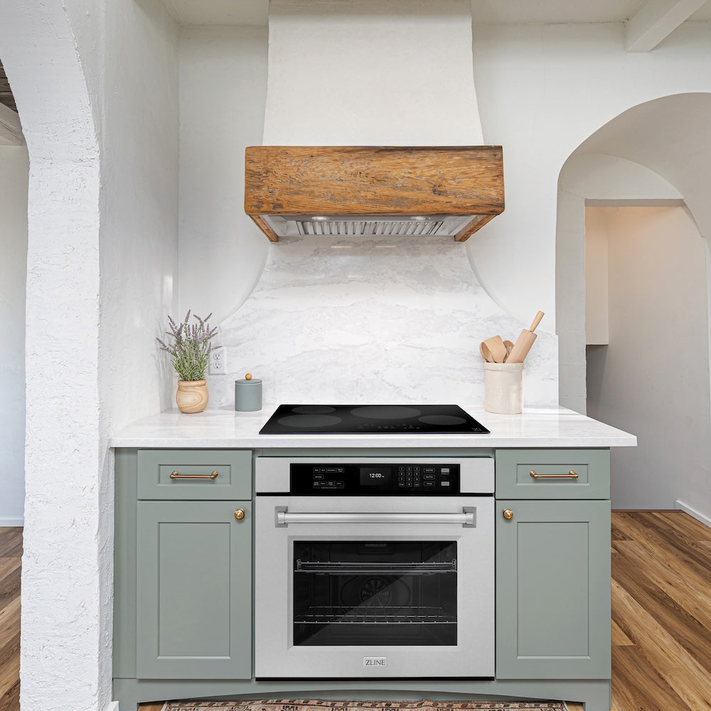 ZLINE 30 in. Professional True Convection Single Wall Oven with Air Fry and Self Clean in DuraSnow® Stainless Steel (WASS-30) in a rustic kitchen below induction cooktop.