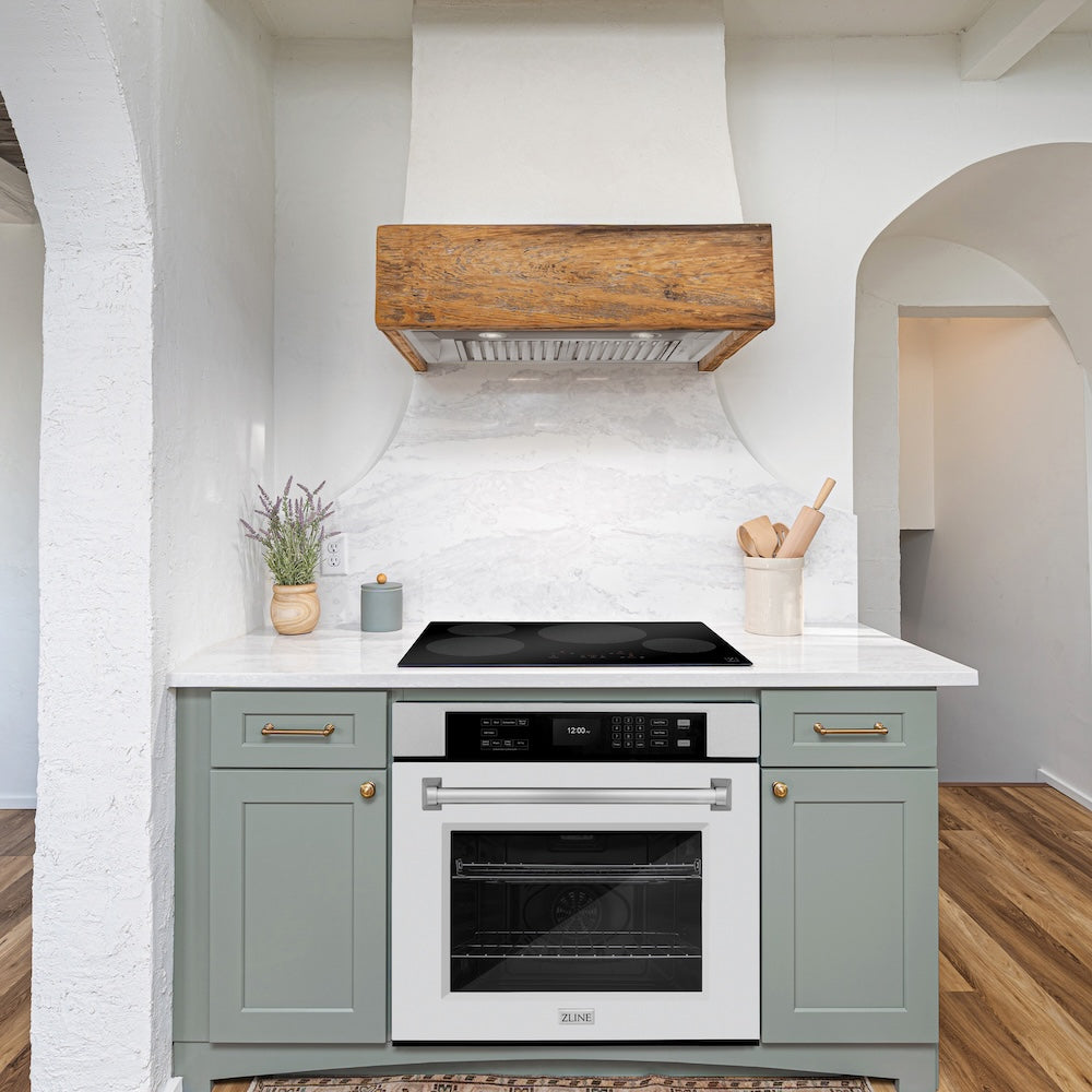 ZLINE 30 in. Professional True Convection Single Wall Oven with Air Fry and Self Clean in DuraSnow® Stainless Steel with White Matte Door (WASS-WM-30) in a rustic kitchen below induction cooktop.