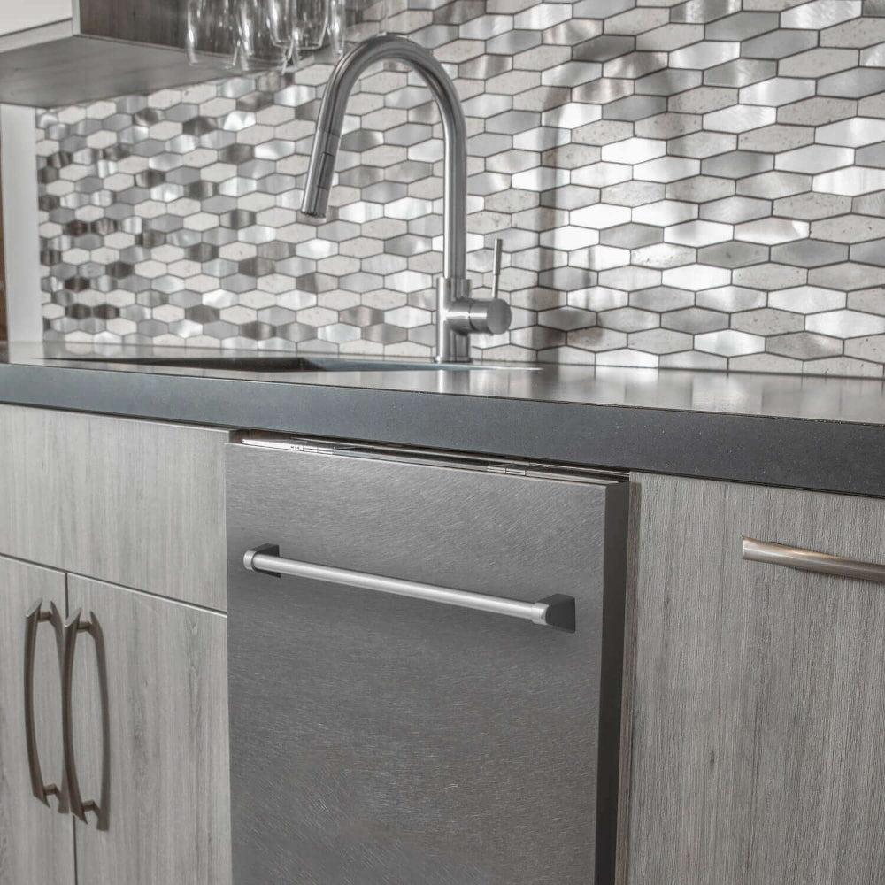 ZLINE 24 in. Top Control Built-In Dishwasher with Satin Stainless Steel Panel and Stainless Steel Tub with Traditional Style Handle, 52dBa (DW-SN-H-24) built-in to cabinets in a luxury kitchen.