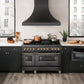 Modern kitchen with a ZLINE Autograph Edition 48 in. 6.0 cu. ft. Legacy Dual Fuel Range with 7 Burner Gas Cooktop and 2 Electric Ovens in Black Stainless Steel and Champagne Bronze Accents (RABZ-48-CB), white countertops, and wooden flooring.