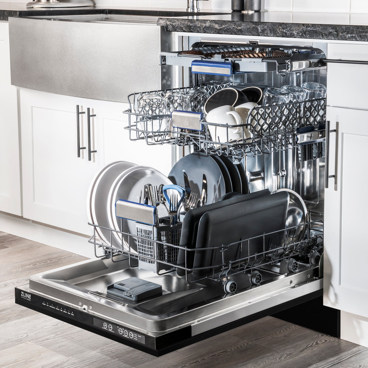 Built-in ZLINE dishwasher fully loaded with dishes on all three racks.