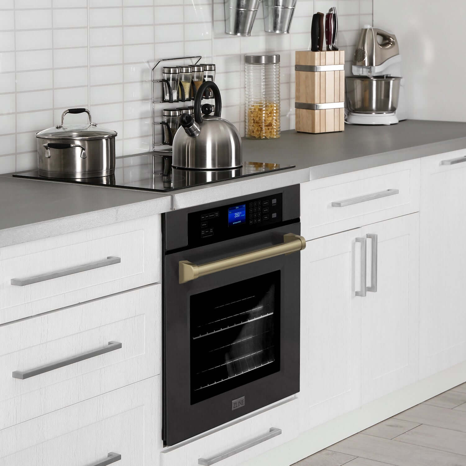 ZLINE Autograph Edition Black Stainless Steel wall oven built-in to kitchen cabinets in a farmhouse-style kitchen.