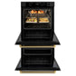 ZLINE Autograph Edition 30 in. Professional True Convection Double Wall Oven with Air Fry and Self Clean in Black Stainless Steel with Polished Gold Helix Handles (WADBZ-30-KG) with open door showing roasted turkey and vegetables.