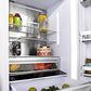 ZLINE Autograph Edition 36 in. 19.6 cu. ft. Built-in 3-Door French Door Refrigerator with Internal Water and Ice Dispenser in Stainless Steel with Champagne Bronze Accents (RBIVZ-304-36-CB) close-up detail, food and drinks inside refrigeration compartment.