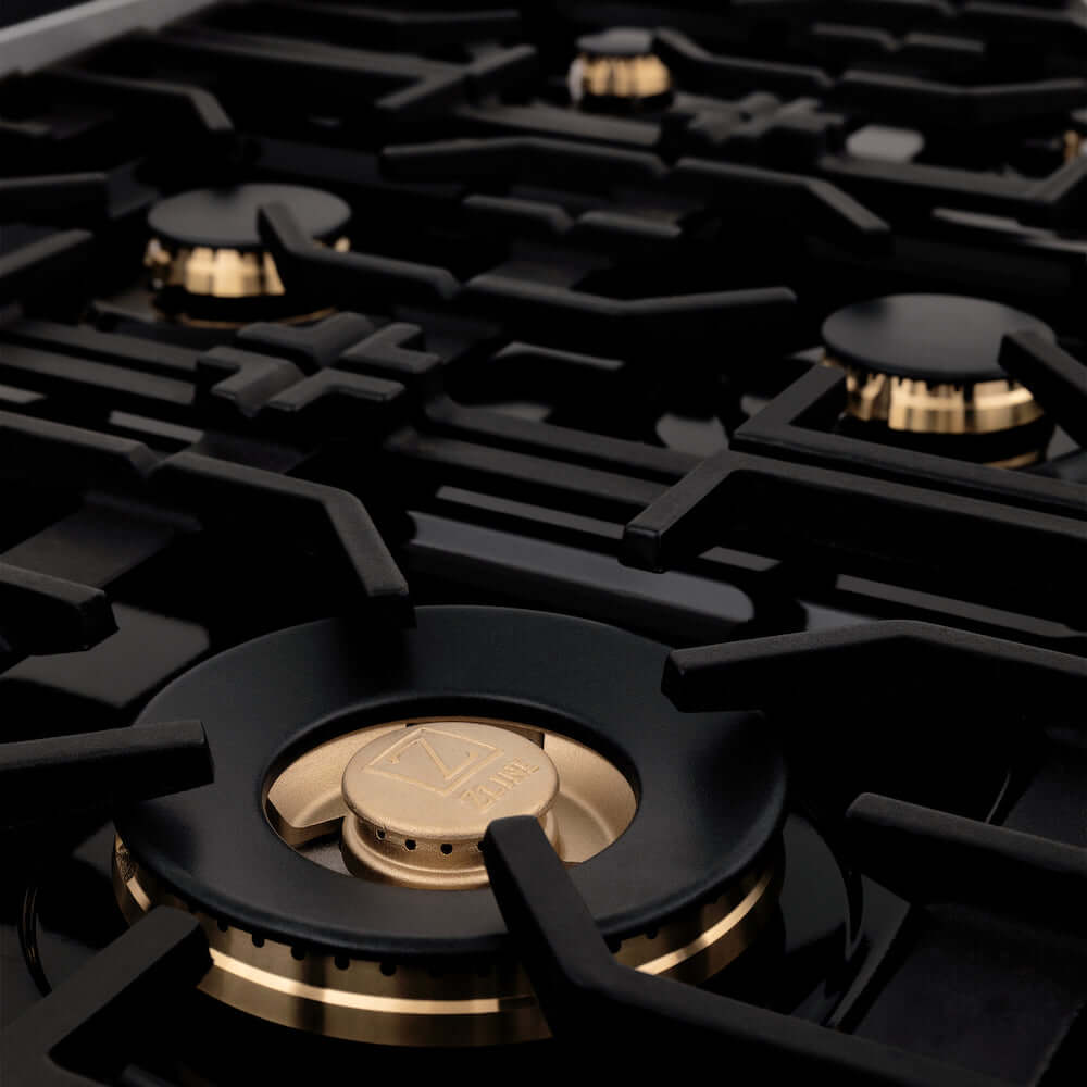 ZLINE brass burners and black porcelain cooktop on Autograph Edition range.