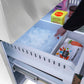ZLINE Autograph Edition 36 in. 28.9 cu. ft. Standard-Depth French Door External Water Dispenser Refrigerator with Dual Ice Maker in Fingerprint-Resistant Stainless Steel and Champagne Bronze Helix Handles (RSMZ-W-36-KCB) person scooping ice from ice cube tray in bottom freezer next to frozen food packages.