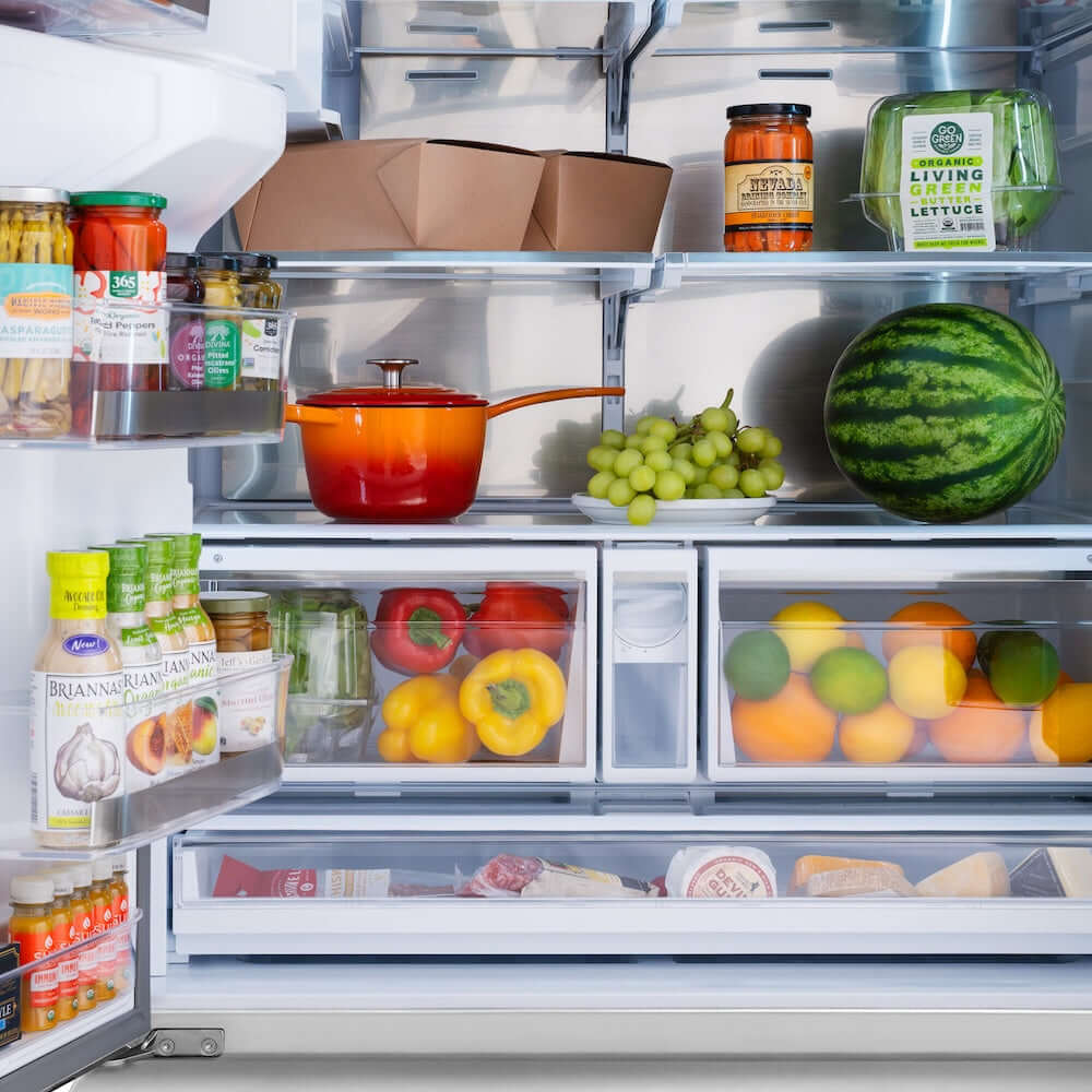 ZLINE Autograph Edition 36 in. 28.9 cu. ft. Standard-Depth French Door External Water Dispenser Refrigerator with Dual Ice Maker in Fingerprint-Resistant Stainless Steel and Polished Nickel Helix Handles (RSMZ-W-36-KPN) front, open, refrigeration compartment with various food items including fruits, vegetables, and packaged goods.