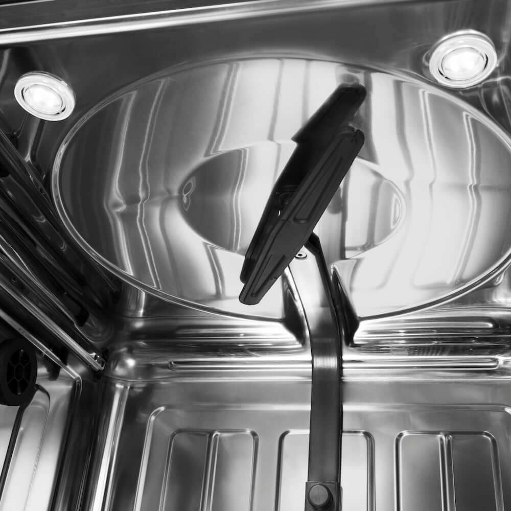 Top spray arm and two LED lights inside ZLINE Monument dishwasher.