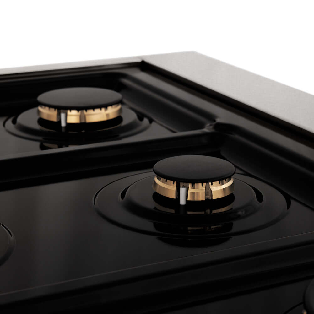 ZLINE Autograph Edition 30 in. 4.0 cu. ft. Dual Fuel Range with Gas Stove and Electric Oven in Satin Stainless Steel with White Matte Door and Polished Gold Accents (RASZ-WM-30-G) close-up, brass burners on black porcelain cooktop without grates from side.