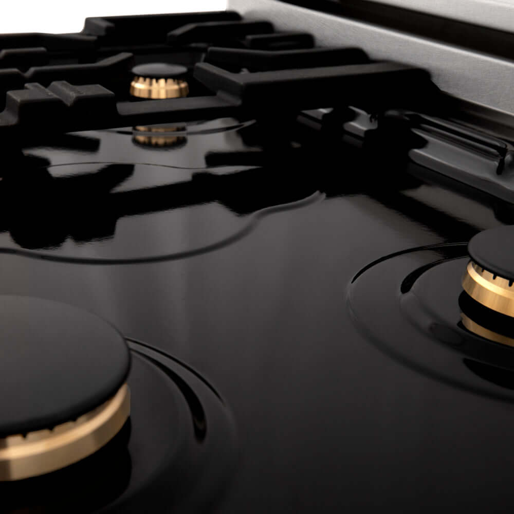 ZLINE brass burners and black porcelain cooktop on Autograph Edition range.