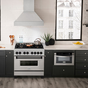 ZLINE Autograph Edition 36 in. 4.6 cu. ft. Legacy Dual Fuel Range with 6 Burner Gas Cooktop and Electric Convection Oven in Satin Stainless Steel and Matte Black Accents (RASZ-SN-36-MB) in a luxury kitchen, front.