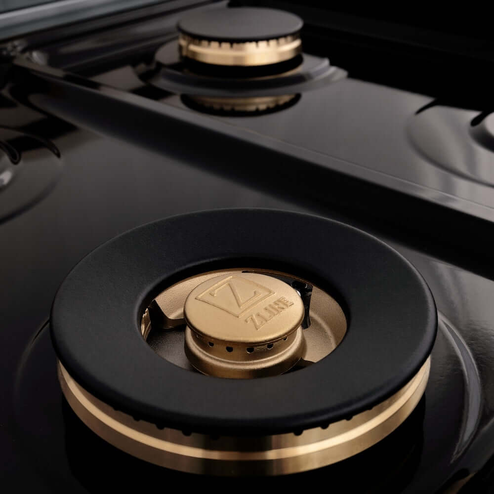 ZLINE Autograph Edition 48 in. 6.0 cu. ft. Legacy Dual Fuel Range with 7 Burner Gas Cooktop and 2 Electric Ovens in Stainless Steel with Black Matte Doors and Champagne Bronze Accents (RAZ-BLM-48-CB) brass burners.