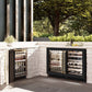 ZLINE Autograph Edition 24 in. Touchstone Dual Zone 44 Bottle Wine Cooler With Black Matte Glass Door And Champagne Bronze Handle (RWDOZ-BLM-24-CB) side, in an outdoor patio area against a stone wall and greenery.