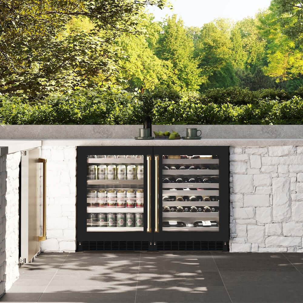 ZLINE Autograph Edition 24 in. Touchstone Dual Zone 44 Bottle Wine Cooler With Black Matte Glass Door And Polished Gold Handle (RWDOZ-BLM-24-G) in a luxury outdoor kitchen, front.