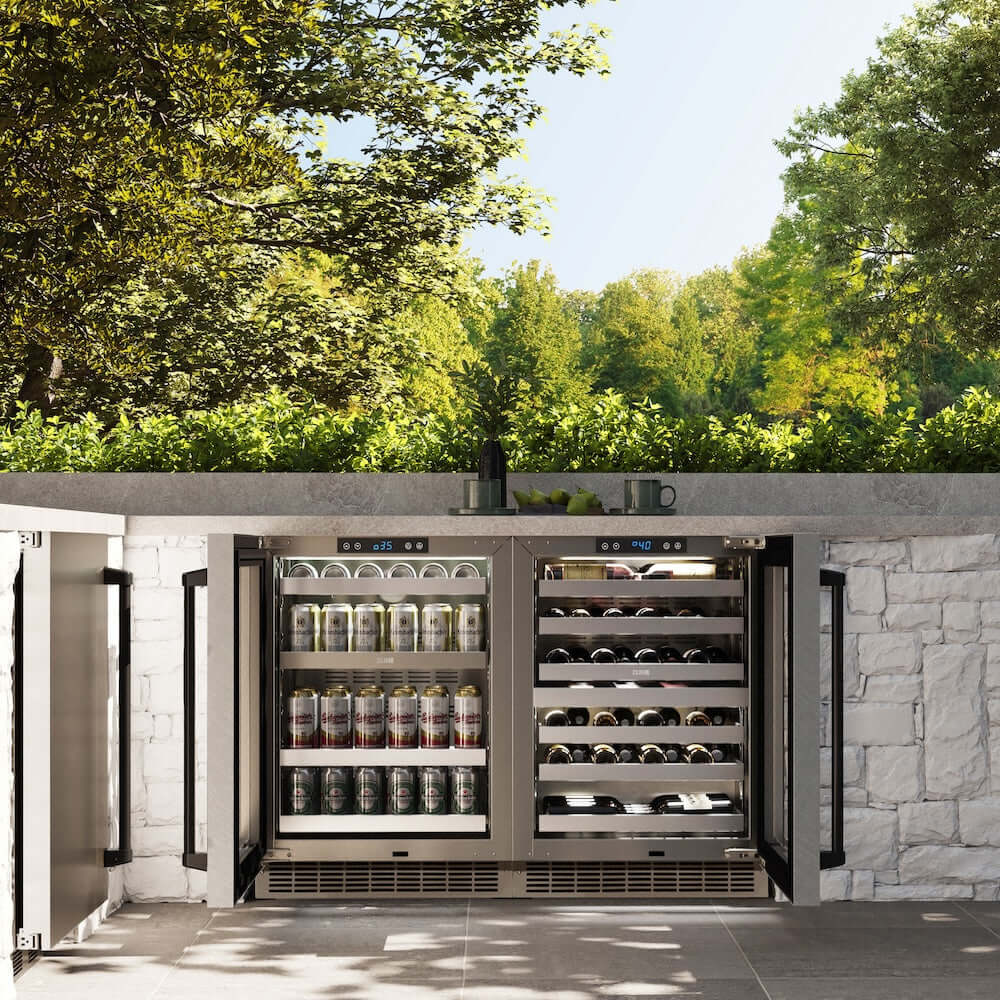 ZLINE Autograph Edition 24 in. Touchstone Dual Zone 44 Bottle Wine Cooler With DuraSnow® Stainless Steel Glass Door And Matte Black Handle (RWDOZ-SN-24-MB) in a luxury outdoor kitchen, front, open with beverages inside.