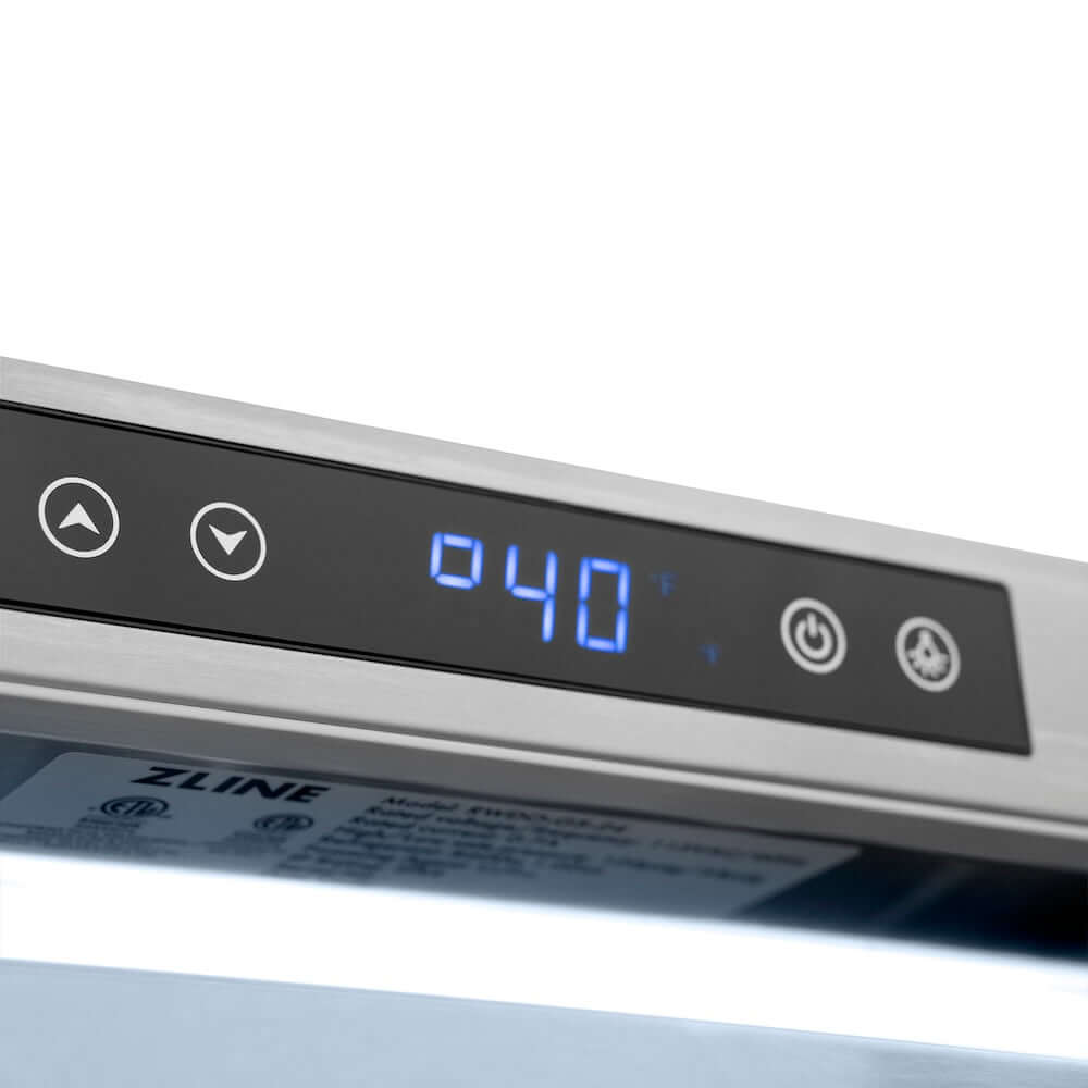 ZLINE Autograph Edition 24 in. Touchstone Dual Zone 44 Bottle Wine Cooler with Stainless Steel Glass Door and Polished Nickel Helix Handle (RWDOZS-24-KPN) digital control panel displaying temperature.