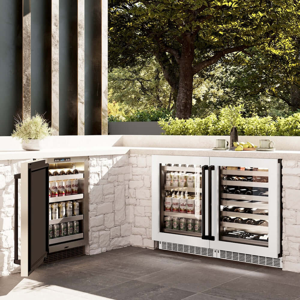 ZLINE Autograph Edition 24 in. Touchstone 151 Can Beverage Fridge With White Matte Glass Door And Matte Black Handle (RBSOZ-WM-24-MB) in a luxury outdoor kitchen, side.