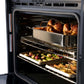ZLINE Autograph Edition 30 in. Professional True Convection Double Wall Oven with Air Fry and Self Clean in Satin Stainless Steel with Polished Gold Helix Handles (WADSZ-30-KG) roasted chicken and vegetables in oven with a metal roasting pan.