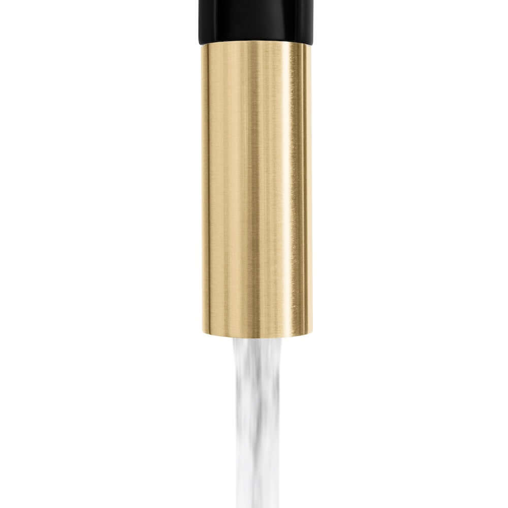 ZLINE Autograph Edition Sierra Pull Down Spring Single Handle Kitchen Faucet in Matte Black and Champagne Bronze (SRA-KF-ZMBCB) spout, on stream mode.