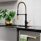 ZLINE Autograph Edition Sierra Pull Down Spring Single Handle Kitchen Faucet in Matte Black and Champagne Bronze (SRA-KF-ZMBCB) lifestyle, water on.