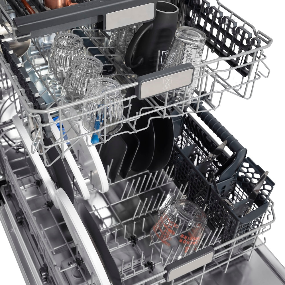 ZLINE Autograph Edition 24 in. Monument Series 3rd Rack Top Touch Control Tall Tub Dishwasher in Stainless Steel with Polished Nickel Helix Handle, 45dBa (DWMTZ-30424-KPN) dish racks with silverware and dishes inside on a white background.