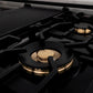 ZLINE Autograph Edition 48 in. 6.0 cu. ft. Legacy Dual Fuel Range with 7 Burner Gas Cooktop and 2 Electric Ovens in Stainless Steel with White Matte Doors and Polished Gold Accents (RAZ-WM-48-G) detail, brass burners on gas cooktop.