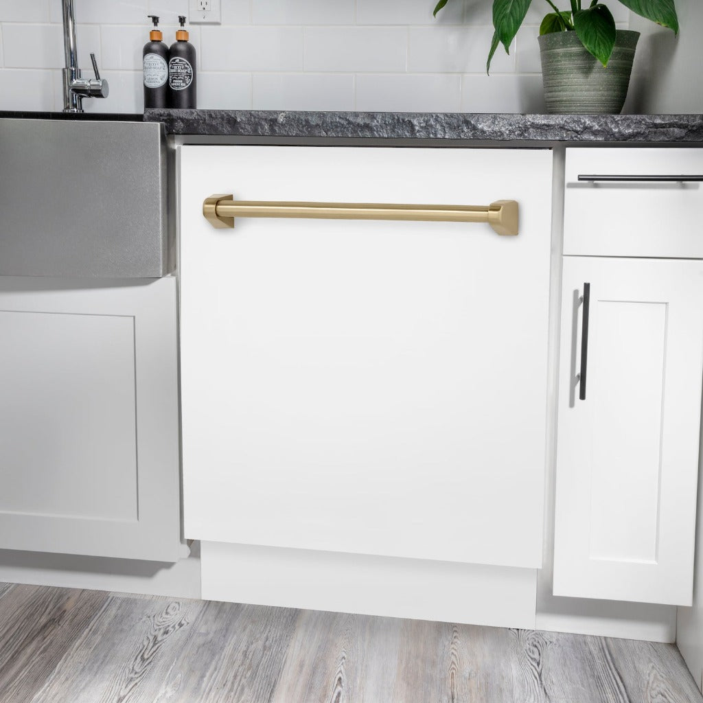 ZLINE Autograph Edition 24 in. Tallac Series 3rd Rack Top Control Built-In Tall Tub Dishwasher in White Matte with Champagne Bronze Handle, 51dBa (DWVZ-WM-24-CB) built-in to white cabinets with granite countertops in a luxury kitchen.