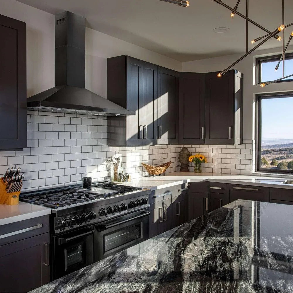 ZLINE Wall Mount Range Hood in Black Stainless Steel (BSKBN) and ZLINE Range in a luxury kitchen.