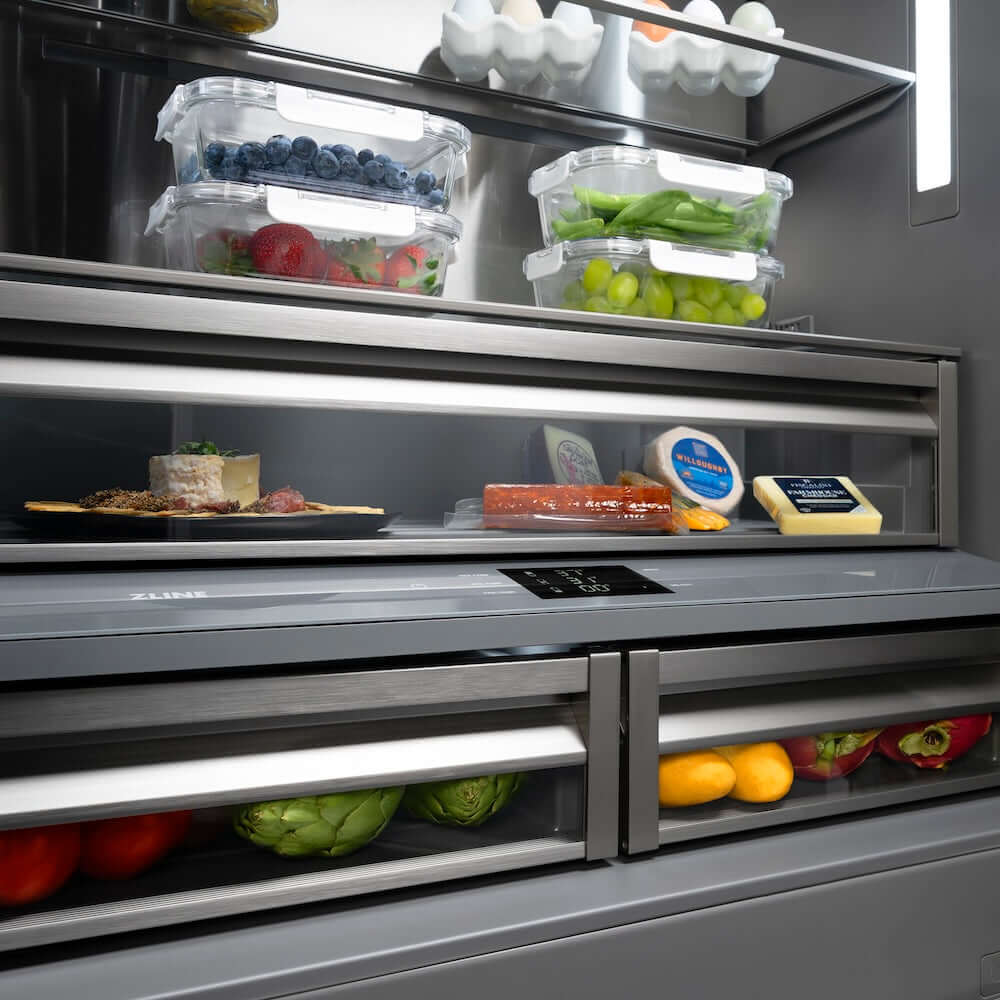 ZLINE Autograph Edition 36 in. 19.6 cu. ft. French Door Built-In Bottom Freezer Refrigerator with Water Dispenser and Ice Maker in Black Stainless Steel with Graphite Gray Interior and Polished Gold Helix Handles (GRBIVZ-BS36KG) flex drawers and shelves displaying various food items.