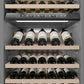ZLINE Autograph Edition 24 in. 12.4 cu. ft. Triple Zone 100 Bottle Panel Ready Column Wine Cooler with Matte Black Accents (RBCWVZ-24-MB) internal storage racks and controls.