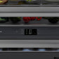 ZLINE Autograph Edition 36 in. 19.8 cu. ft. Built-In Bottom Freezer Refrigerator with Water Dispenser and Ice Maker in Satin Stainless Steel with Graphite Gray Interior and Champagne Bronze Accents (GRBITZ-SN-36-CB) digital temperature display and crisper drawer with fresh produce inside.