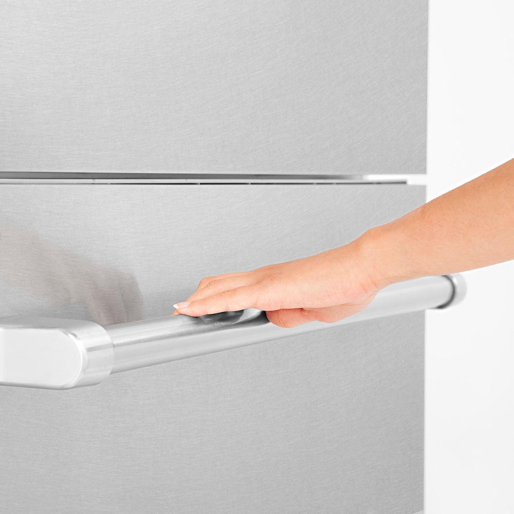 ZLINE 30 in. 16.1 cu. ft. Built-In Bottom Freezer Refrigerator with Water Dispenser and Ice Maker in Satin Stainless Steel (RBIV-SN-30) person opening bottom freezer drawer.