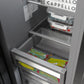 ZLINE 24 in. 12.4 cu. ft. Column Freezer in Stainless Steel with Graphite Gray Interior (RCFV-304-24) shelving with food.