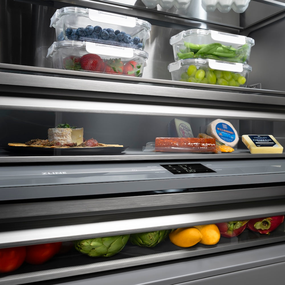 ZLINE Autograph Edition 60 in. 32.2 cu. ft. French Door Built-In Bottom Freezer Refrigerator with Water Dispenser and Ice Maker in Stainless Steel with Graphite Gray Interior and Champagne Bronze Accents (GRBIVZ-304-60CB) close-up, food inside flex drawer.