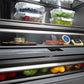 ZLINE Autograph Edition 60 in. 32.2 cu. ft. French Door Built-In Bottom Freezer Refrigerator with Water Dispenser and Ice Maker in Stainless Steel with Graphite Gray Interior and Matte Black Accents (GRBIVZ-304-60MB) close-up, food inside flex drawer.