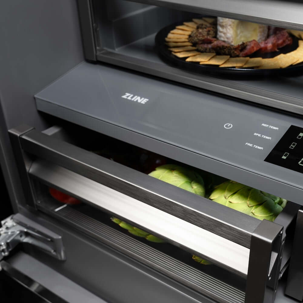 ZLINE Autograph Edition 36 in. 19.6 cu. ft. French Door Built-In Bottom Freezer Refrigerator with Water Dispenser and Ice Maker in Stainless Steel with Graphite Gray Interior and Champagne Bronze Helix Handles (GRBIVZ-30436KCB) flex drawers and shelves displaying various food items.