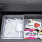 ZLINE Autograph Edition 60 in. 32.2 cu. ft. French Door Built-In Bottom Freezer Refrigerator with Water Dispenser and Ice Maker in Stainless Steel with Graphite Gray Interior and Polished Gold Helix Handles (GRBIVZ-30460KG) frozen food packages including raspberries and dragon fruit in bottom freezer drawer with ice bin.
