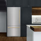 ZLINE Autograph Edition 36 in. 19.8 cu. ft. Built-In Bottom Freezer Refrigerator with Water Dispenser and Ice Maker in Stainless Steel with Champagne Bronze Accents (RBITZ-304-36CB) lifestyle, in a luxury kitchen.