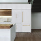 ZLINE Autograph Edition 30 in. 16.1 cu. ft. Built-In Bottom Freezer Refrigerator with Water Dispenser and Ice Maker in White Matte with Champagne Bronze Accents (RBIVZ-WM-30-CB) in a luxury kitchen.