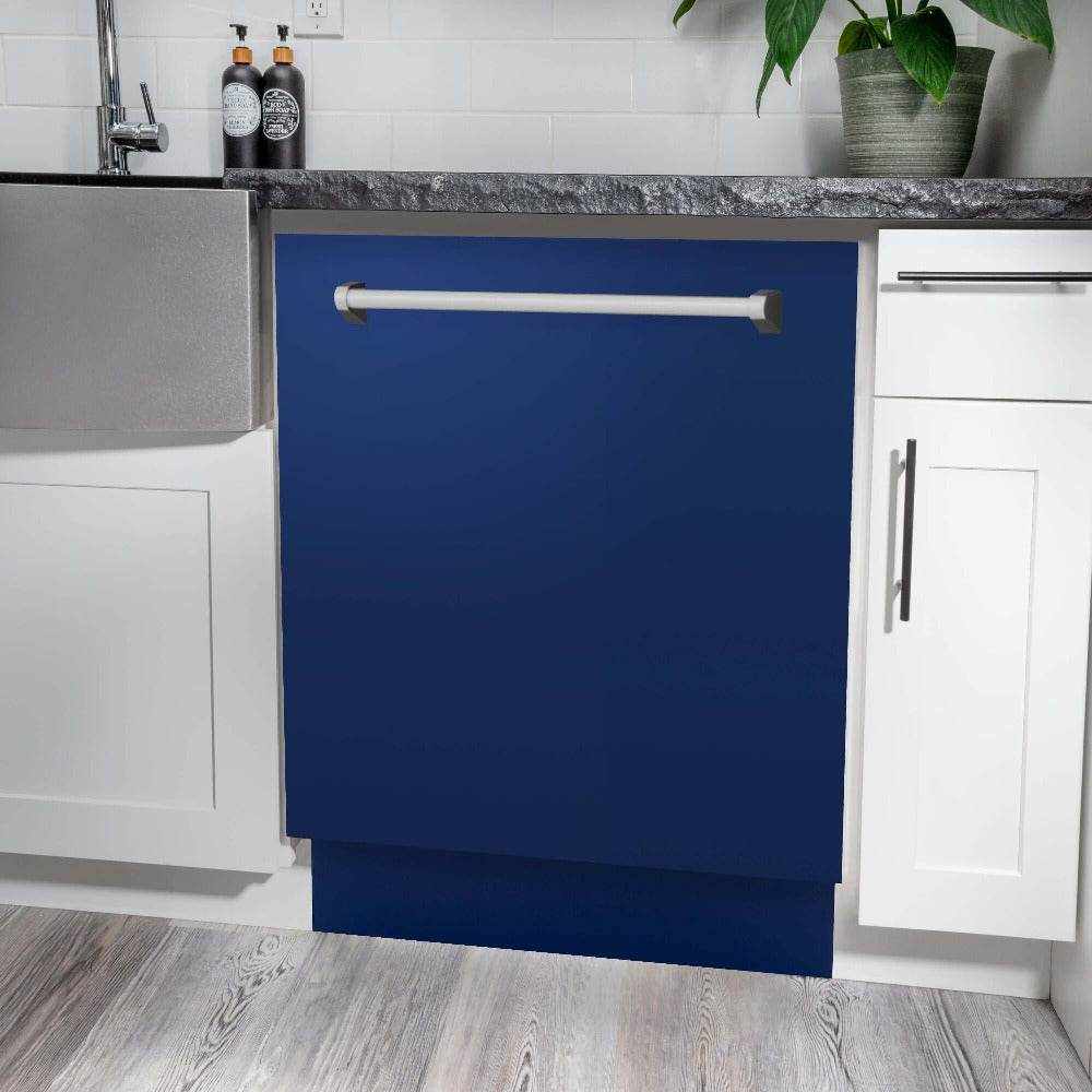 ZLINE 24 in. Monument Series 3rd Rack Top Touch Control Dishwasher in Blue Gloss with Stainless Steel Tub, 45dBa (DWMT-BG-24) built-in to white cabinets with granite countertops in a luxury kitchen.